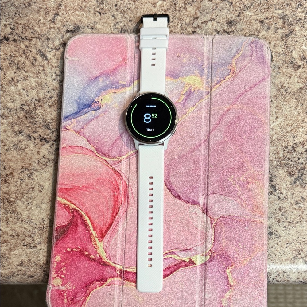 Garmin White Smartwatch with Black and Blue Interface